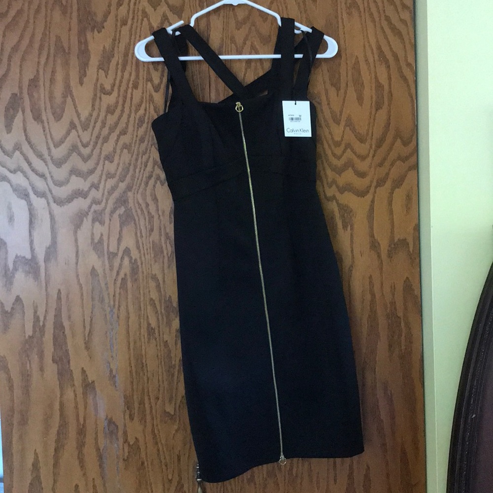 Never worn, doesn’t fit